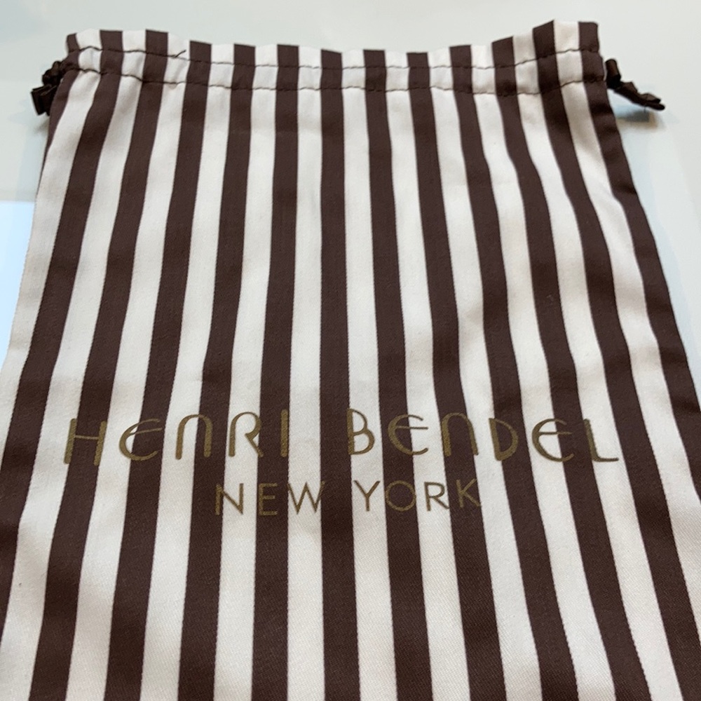 Brown and white Henri Bendel Dustbag 9”x15.5”